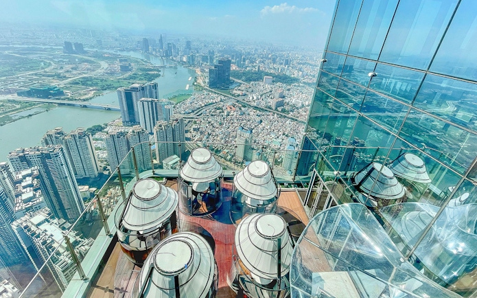Skyview from Landmark 81 in Saigon overlooking cityscape and river.