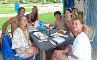 Group enjoying a meal during Isla Mamey tour, Panama City.