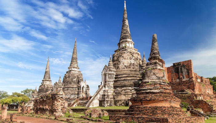 Wat Phra Si Sanphet ancient temple ruins with chedis in Ayutthaya, Thailand.