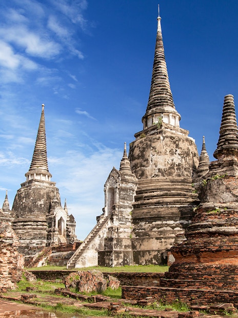 Wat Phra Si Sanphet ancient temple ruins with chedis in Ayutthaya, Thailand.