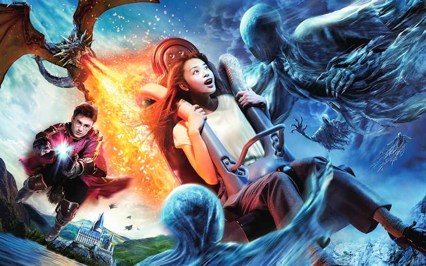 Tourist on thrilling ride at Universal Studios Japan with dragon and wizard theme.