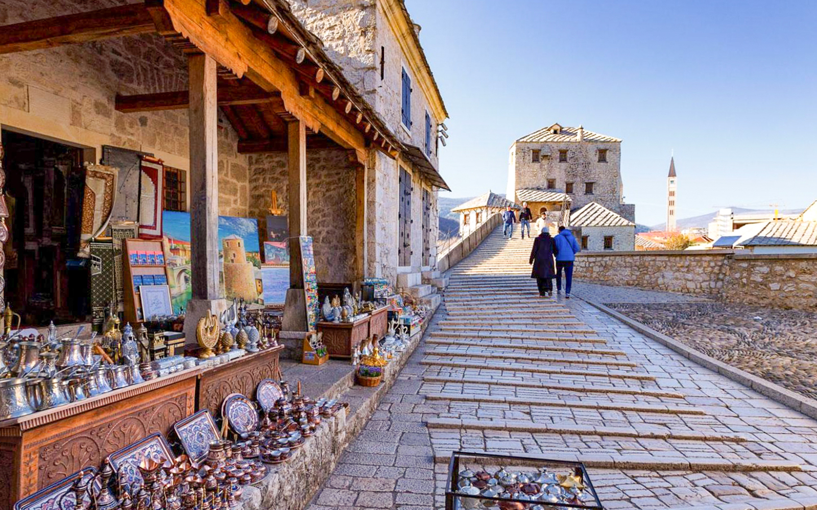 Market stalls with traditional crafts near the Old Bridge in Mostar.