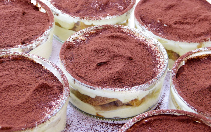 Tiramisu desserts prepared in a masterclass near the Colosseum.