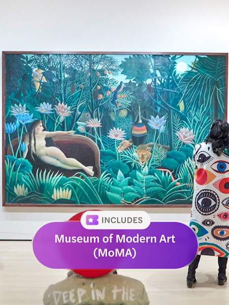 Visitors viewing a painting at the Museum of Modern Art.