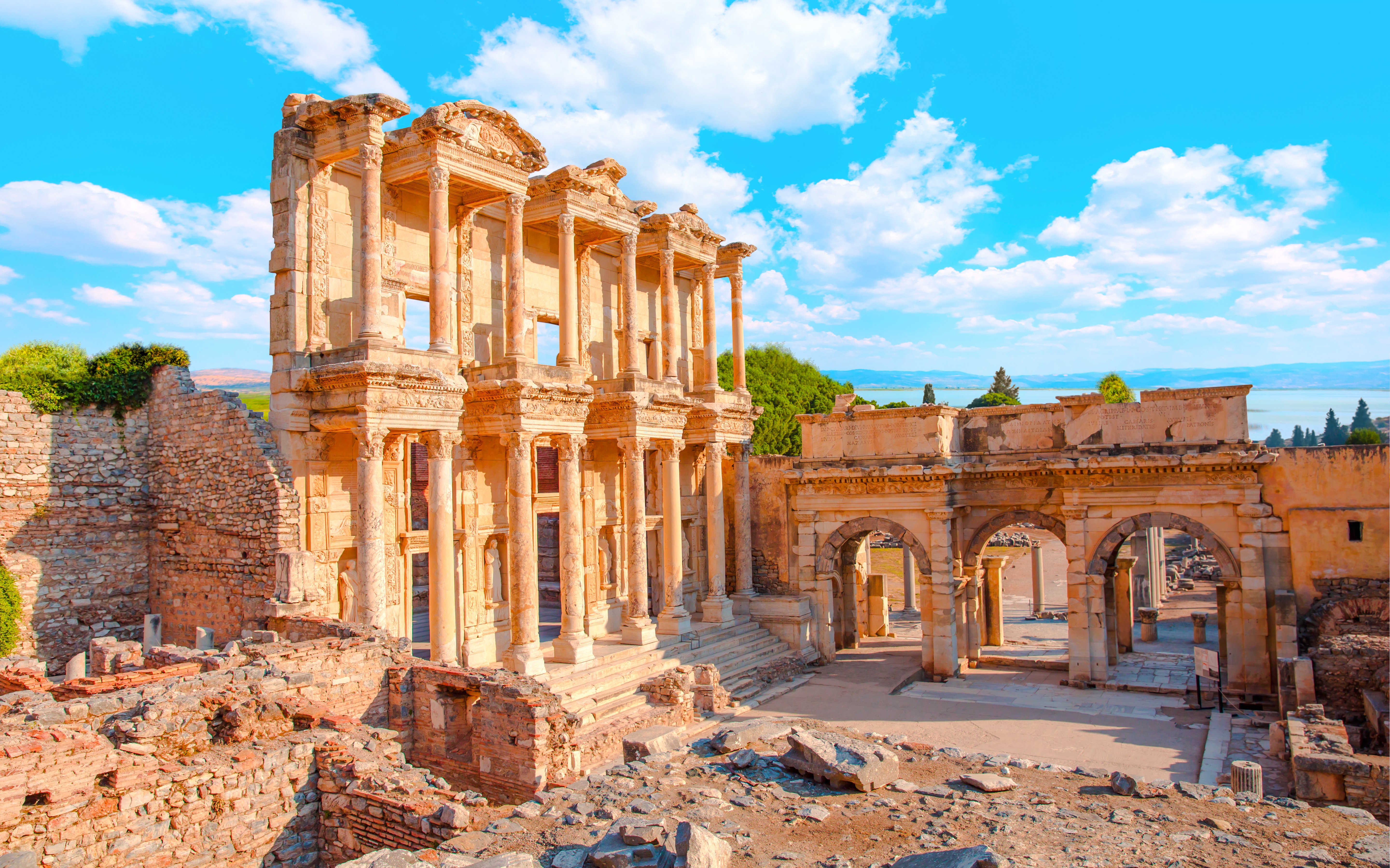 Celsus Library ruins in Ephesus, Turkey, with ancient stone columns and arches.