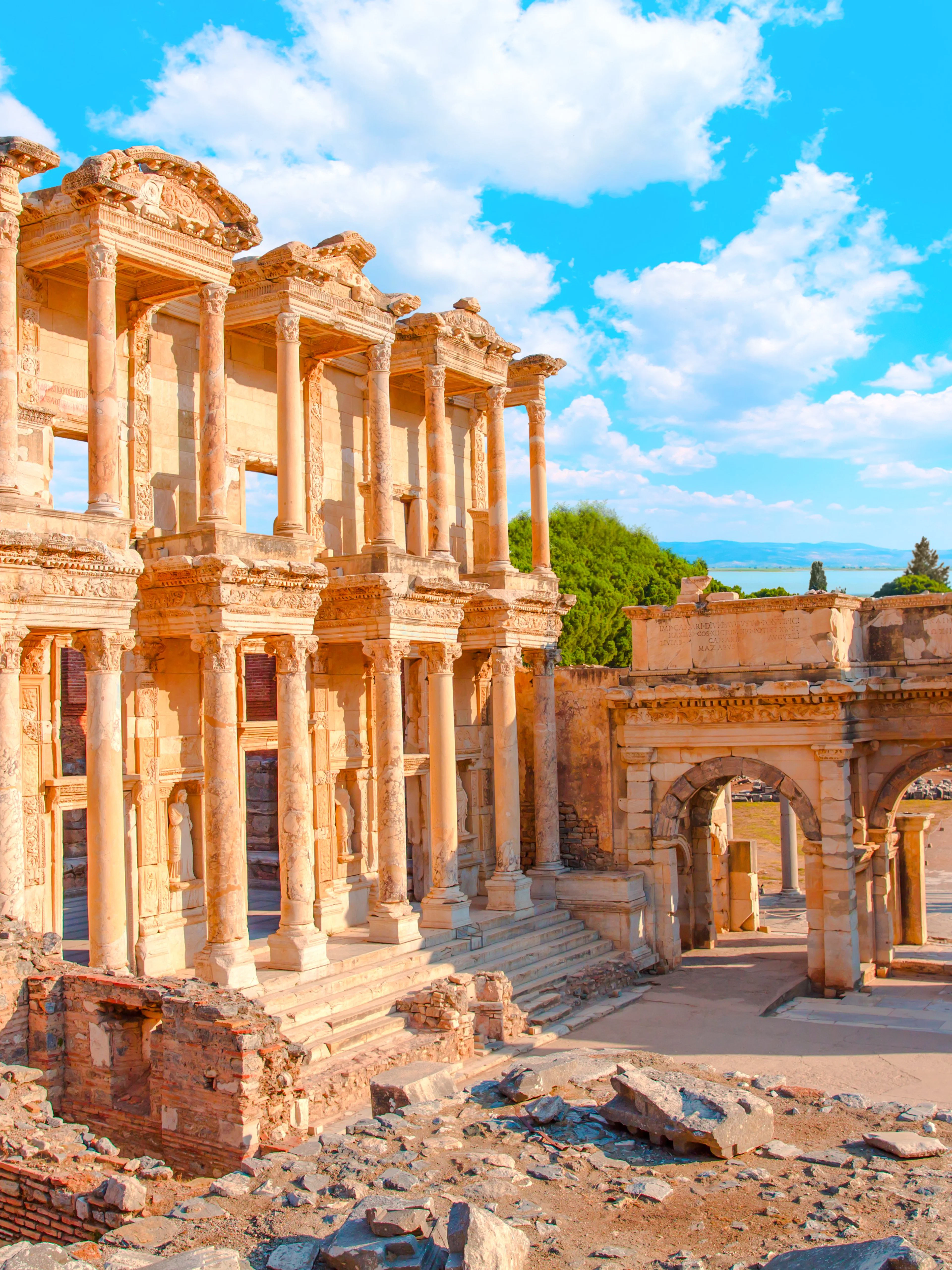 Celsus Library ruins in Ephesus, Turkey, with ancient stone columns and arches.