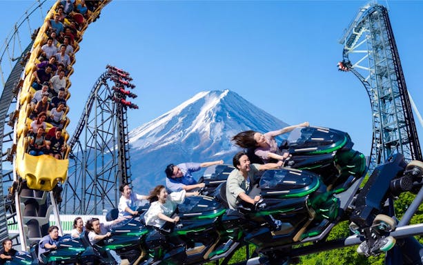 Zokkon roller coaster with Mount Fuji in background at Fuji-Q Highland, Japan.