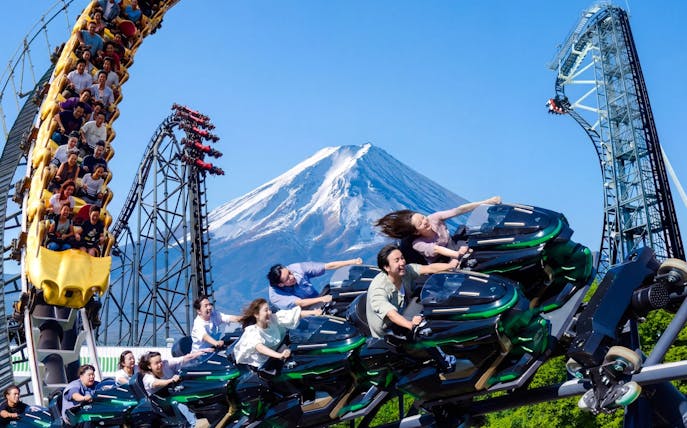 Zokkon roller coaster with Mount Fuji in background at Fuji-Q Highland, Japan.