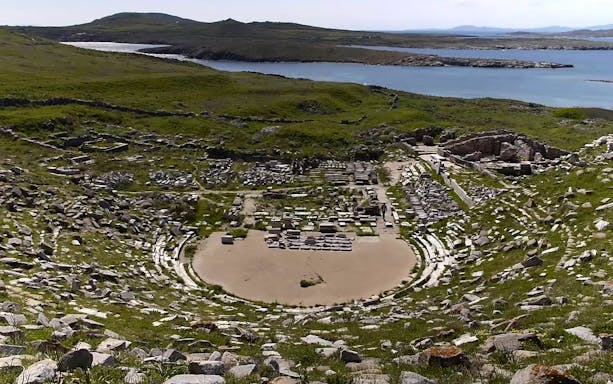 Delos Archaeological Site amphitheater with sea view, Greece.
