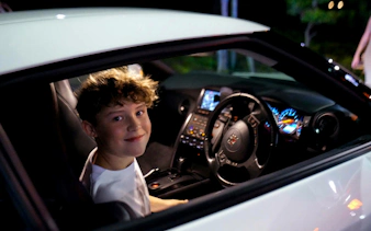 Guest inside a car during JDM Tokyo Car Meetup Night Tour in Tokyo.