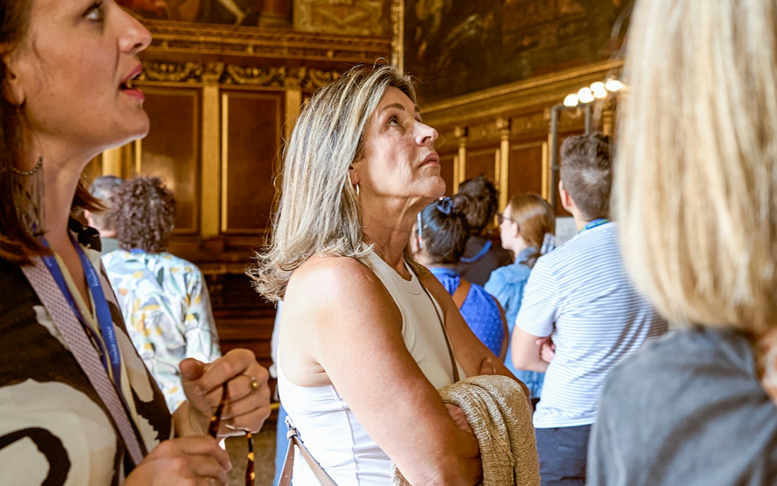 Visitor observing art during a tour at Doge’s Palace, Venice.