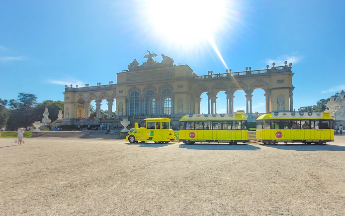 Panoramic train in front of the Gloriette at Schönbrunn Palace, Vienna.