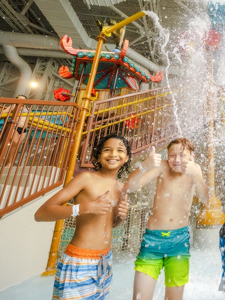 Children enjoying water splash at KingFu Panda Temple of Awesomeness, American Dream Water Park.