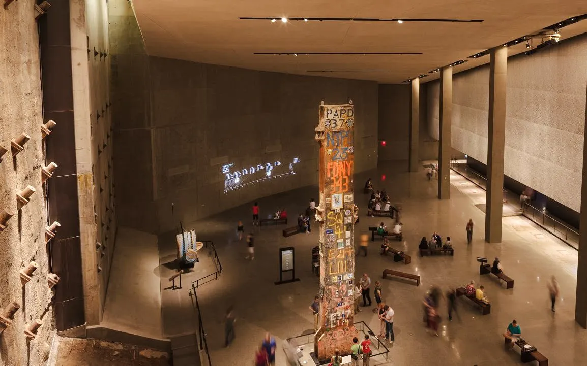 9/11 Memorial & Museum interior with Last Column and visitors.