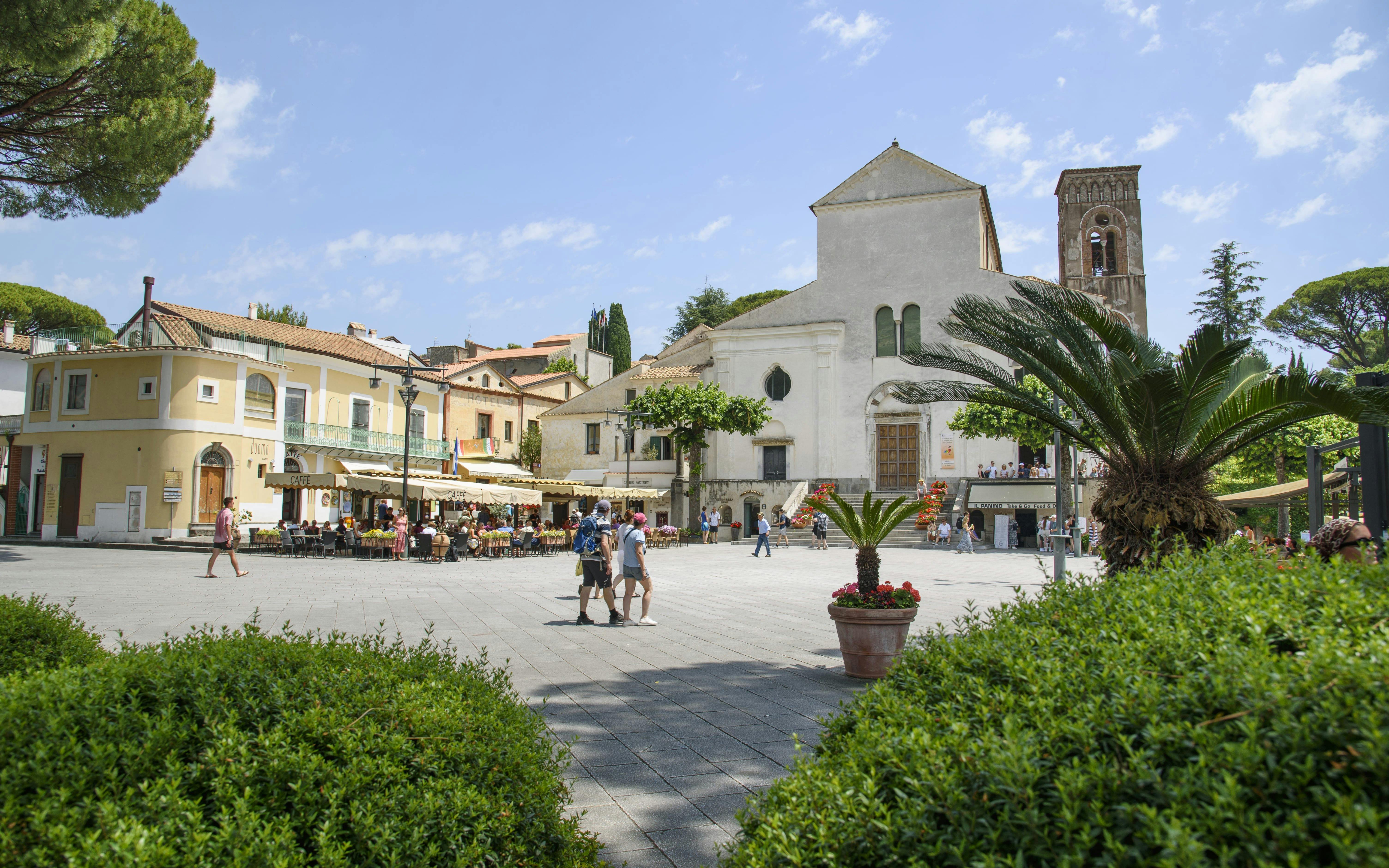 Ravello town square with historic church and outdoor café, part of Amalfi Coast boat tour from Sorrento.