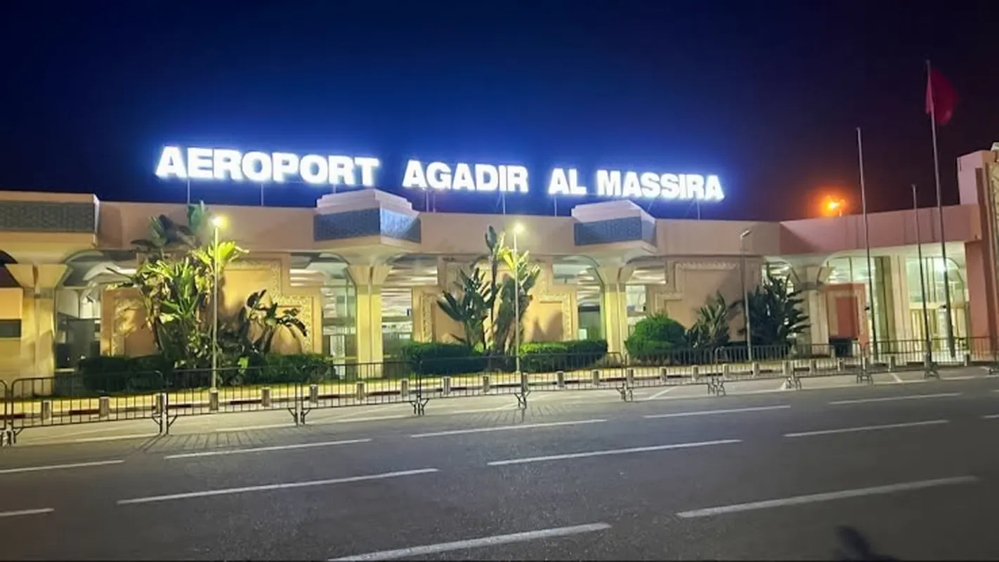 Agadir Al Massira Airport entrance at night, Agadir, Morocco.