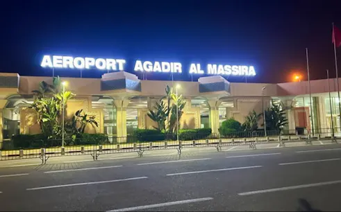 Agadir Al Massira Airport entrance at night, Agadir, Morocco.