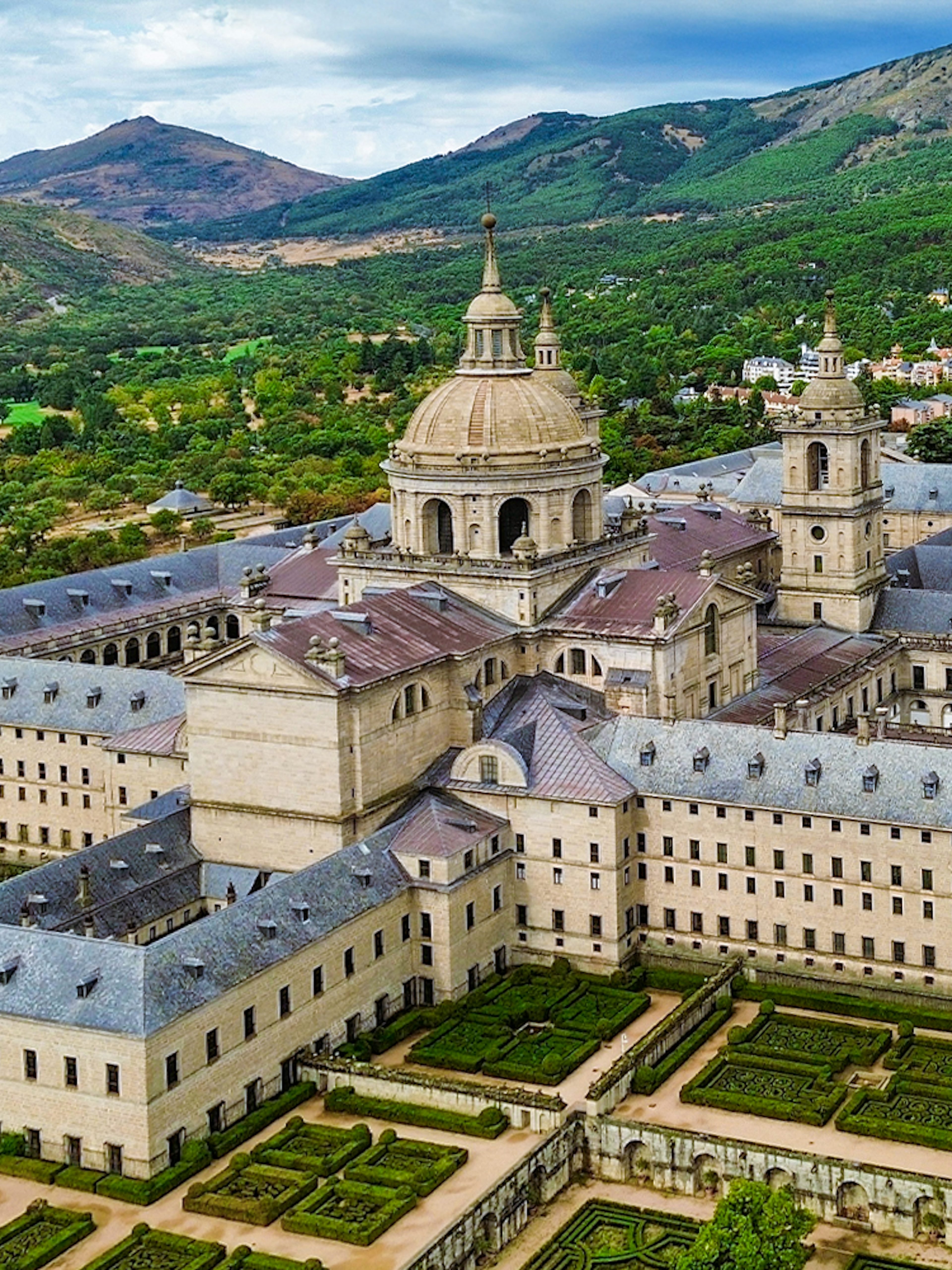 El Escorial monastery complex with gardens in San Lorenzo de El Escorial, Spain.