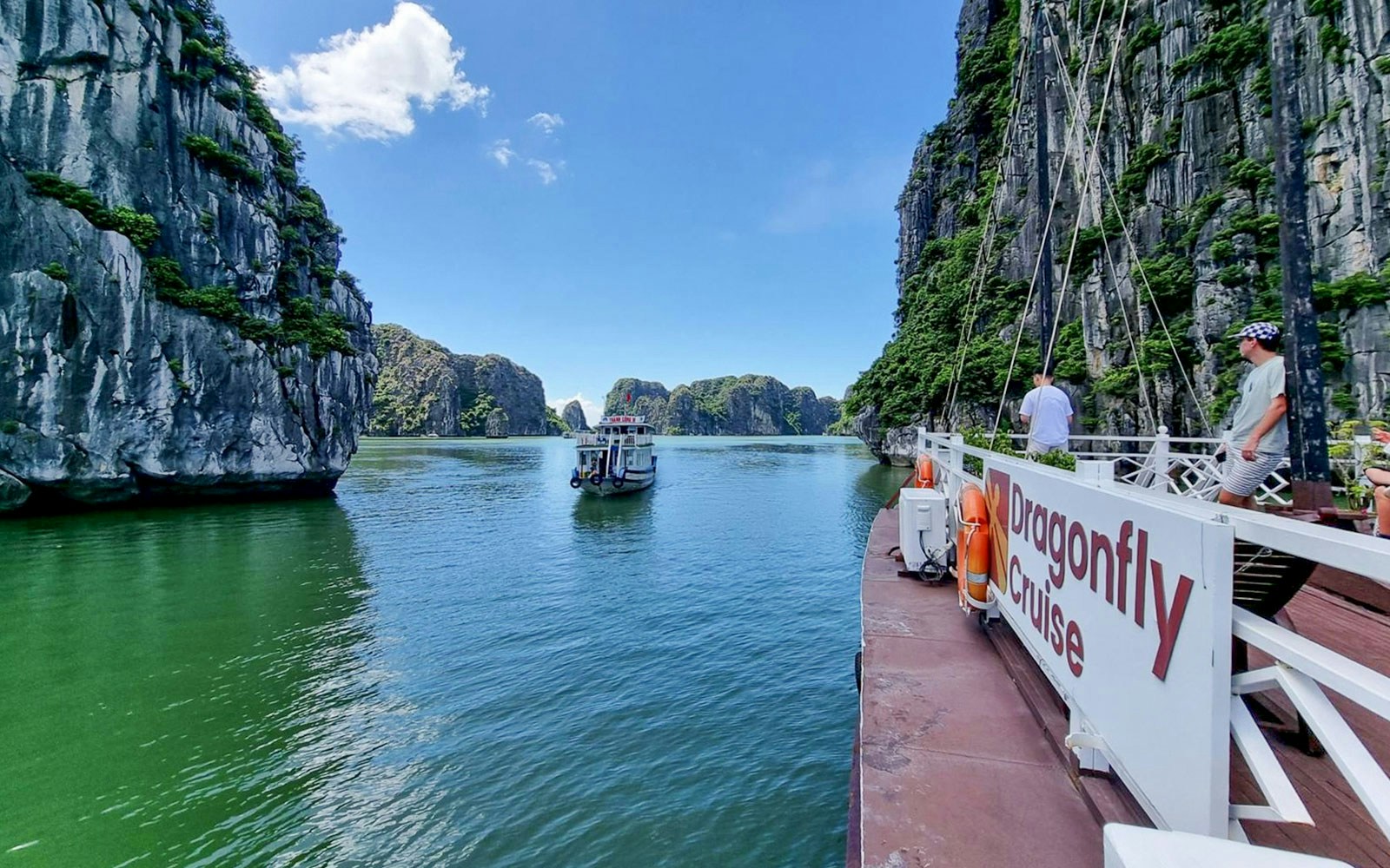 Ha Long Bay limestone karsts and emerald waters on a 3-star cruise, Vietnam.
