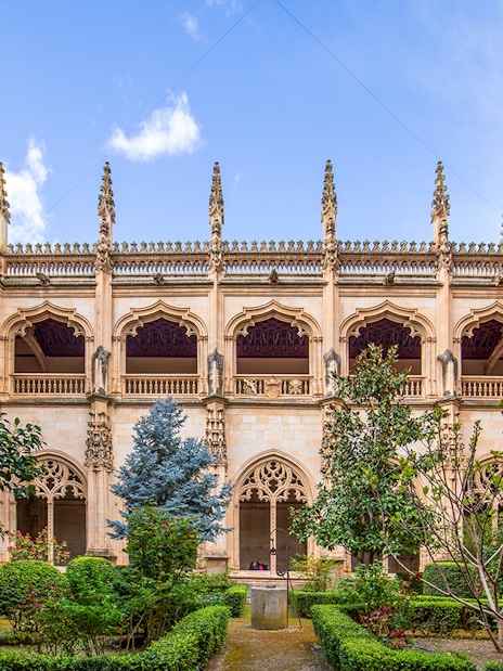 San Juan de los Reyes Monastery courtyard with Gothic arches, Toledo.