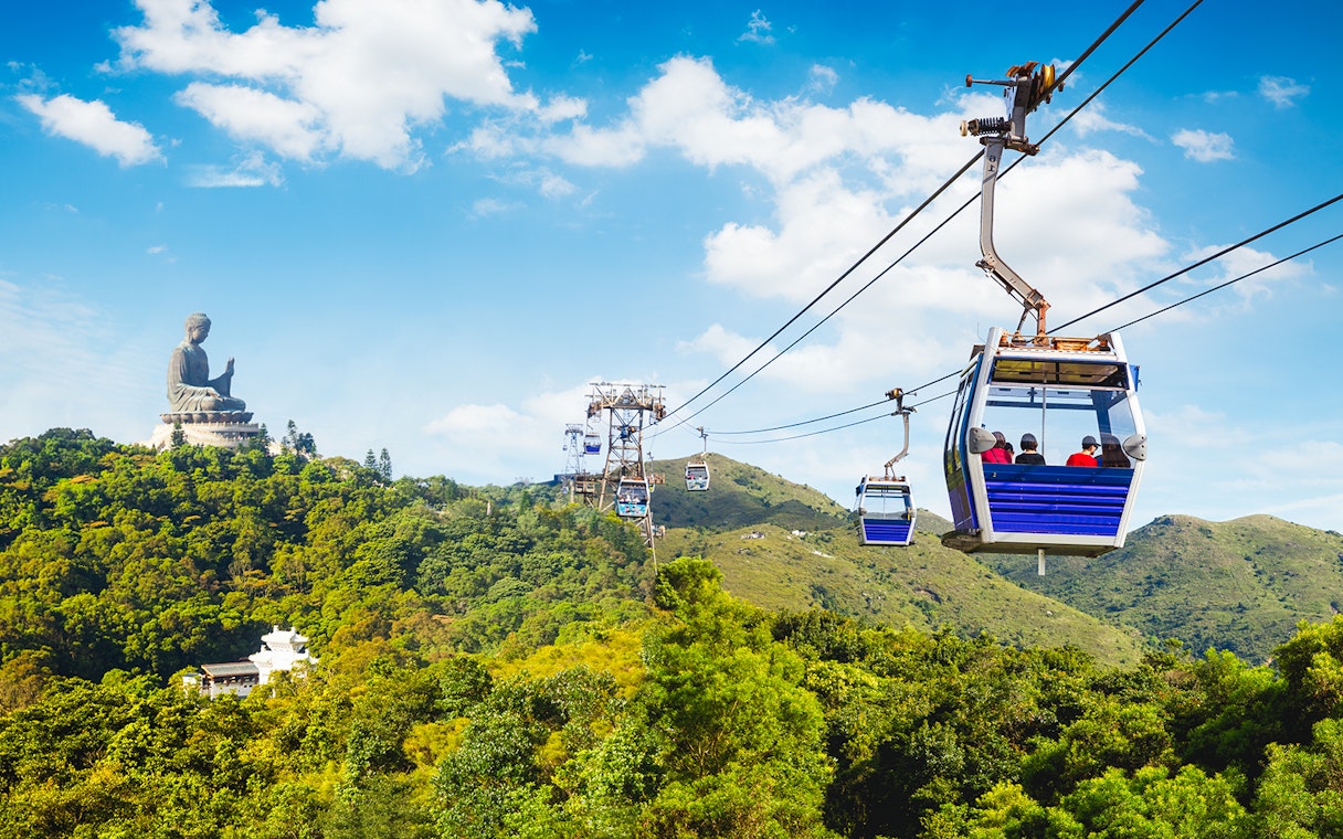 Ngong Ping Cable Car with Tian Tan Buddha on Lantau Island, Hong Kong.