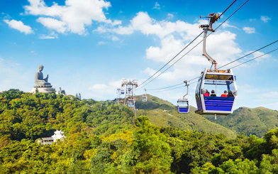Ngong Ping Cable Car with Tian Tan Buddha on Lantau Island, Hong Kong.