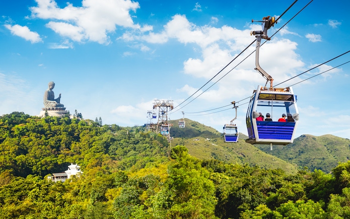 Ngong Ping Cable Car with Tian Tan Buddha on Lantau Island, Hong Kong.
