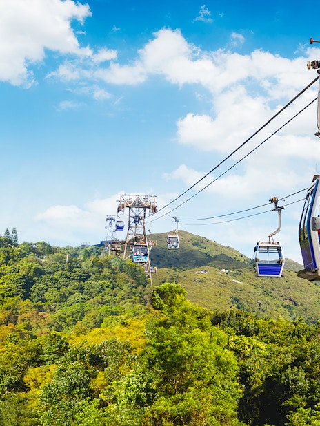 Ngong Ping Cable Car with Tian Tan Buddha on Lantau Island, Hong Kong.