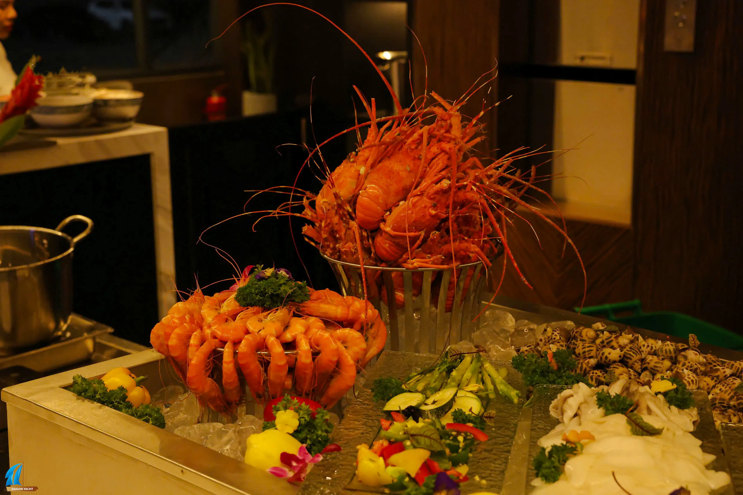 Seafood platter with prawns and lobsters on a Ho Chi Minh City dinner cruise.