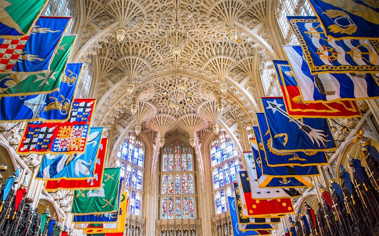 Lady Chapel ceiling and colorful banners at Westminster Abbey, London.
