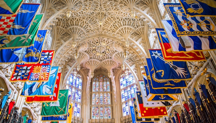 Lady Chapel ceiling and colorful banners at Westminster Abbey, London.