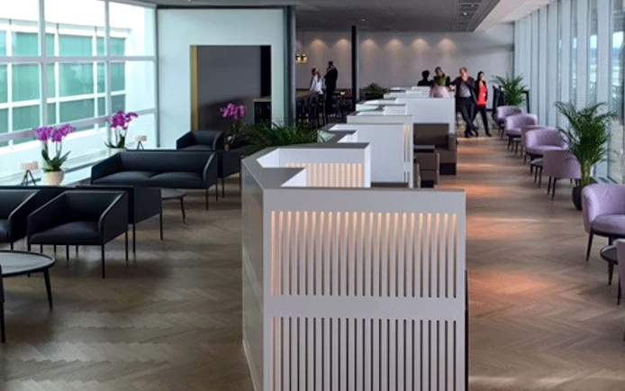 Aspire SKY Lounge seating area with modern decor at Zurich Airport Terminal E.