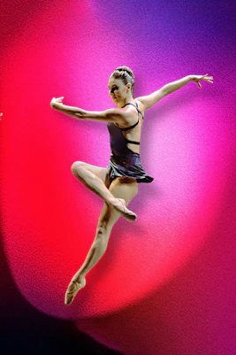 Tiler Peck performing a dance leap in "Turn It Out with Tiler Peck & Friends" show.
