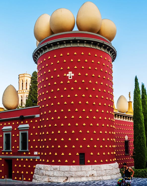 Dali Museum's red tower with egg sculptures, Figueres, Spain.