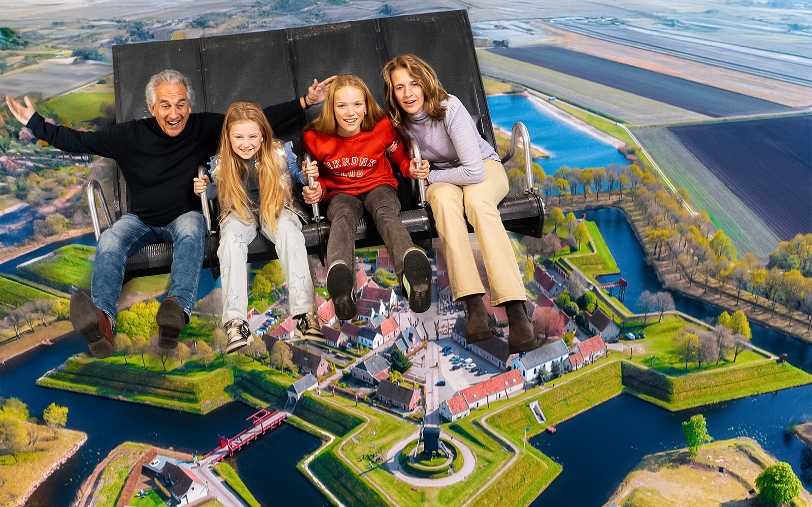 Tourists on 5D ride at This Is Holland, flying over Dutch landscape.
