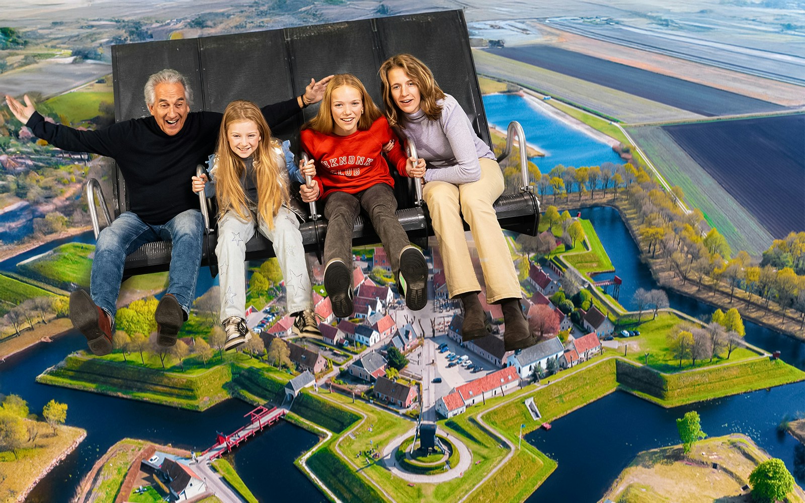 Tourists on 5D ride at This Is Holland, flying over Dutch landscape.