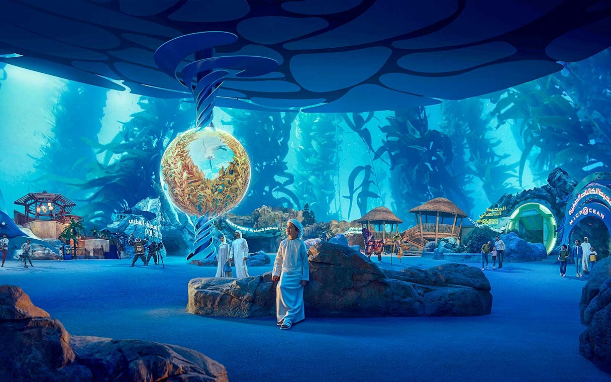 Visitors exploring underwater-themed exhibits at SeaWorld Abu Dhabi.