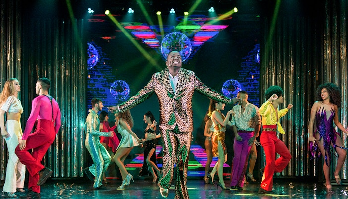 Cabaret dance performers on stage in Paris