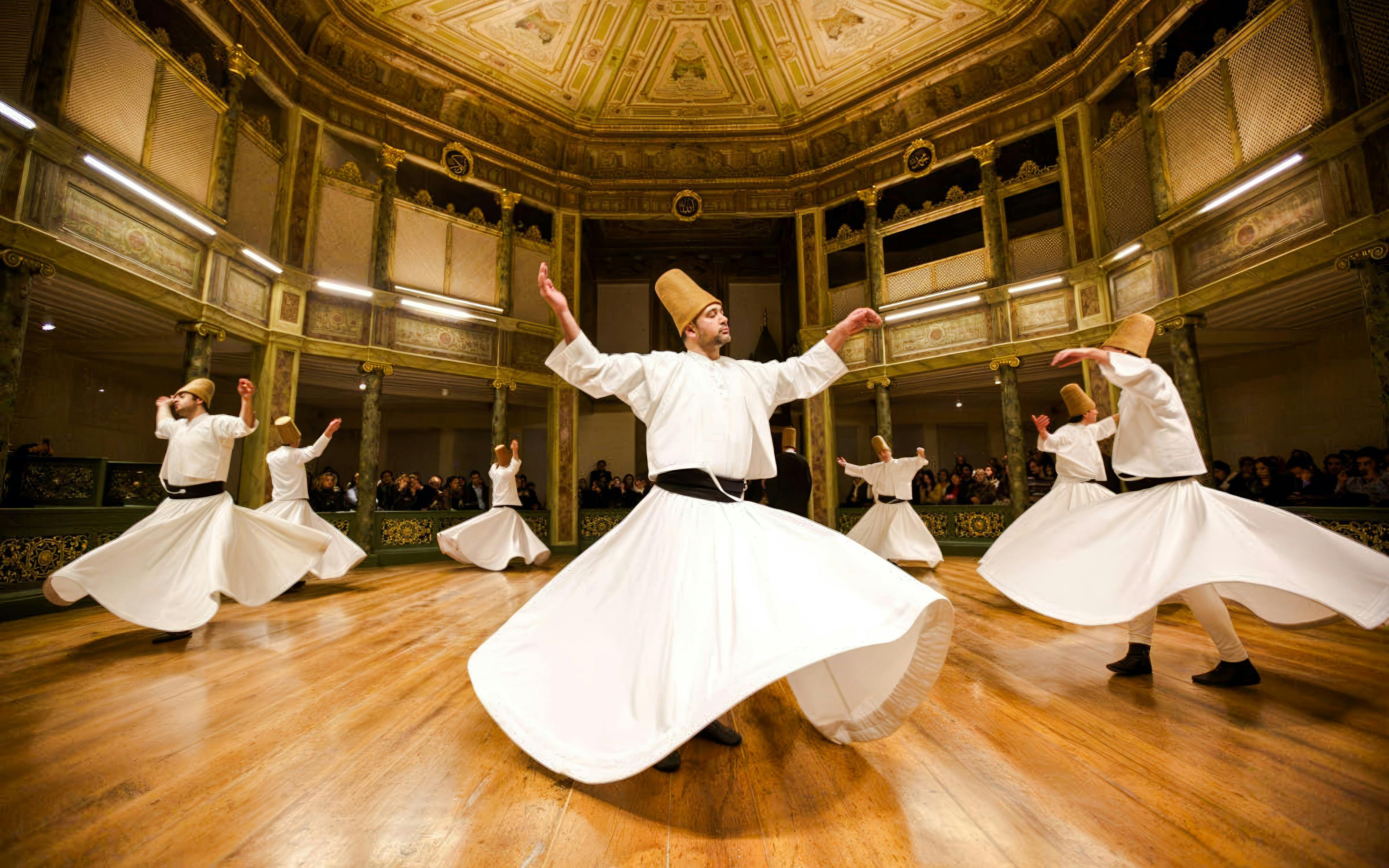 Whirling Dervishes performing in a historic Istanbul venue.