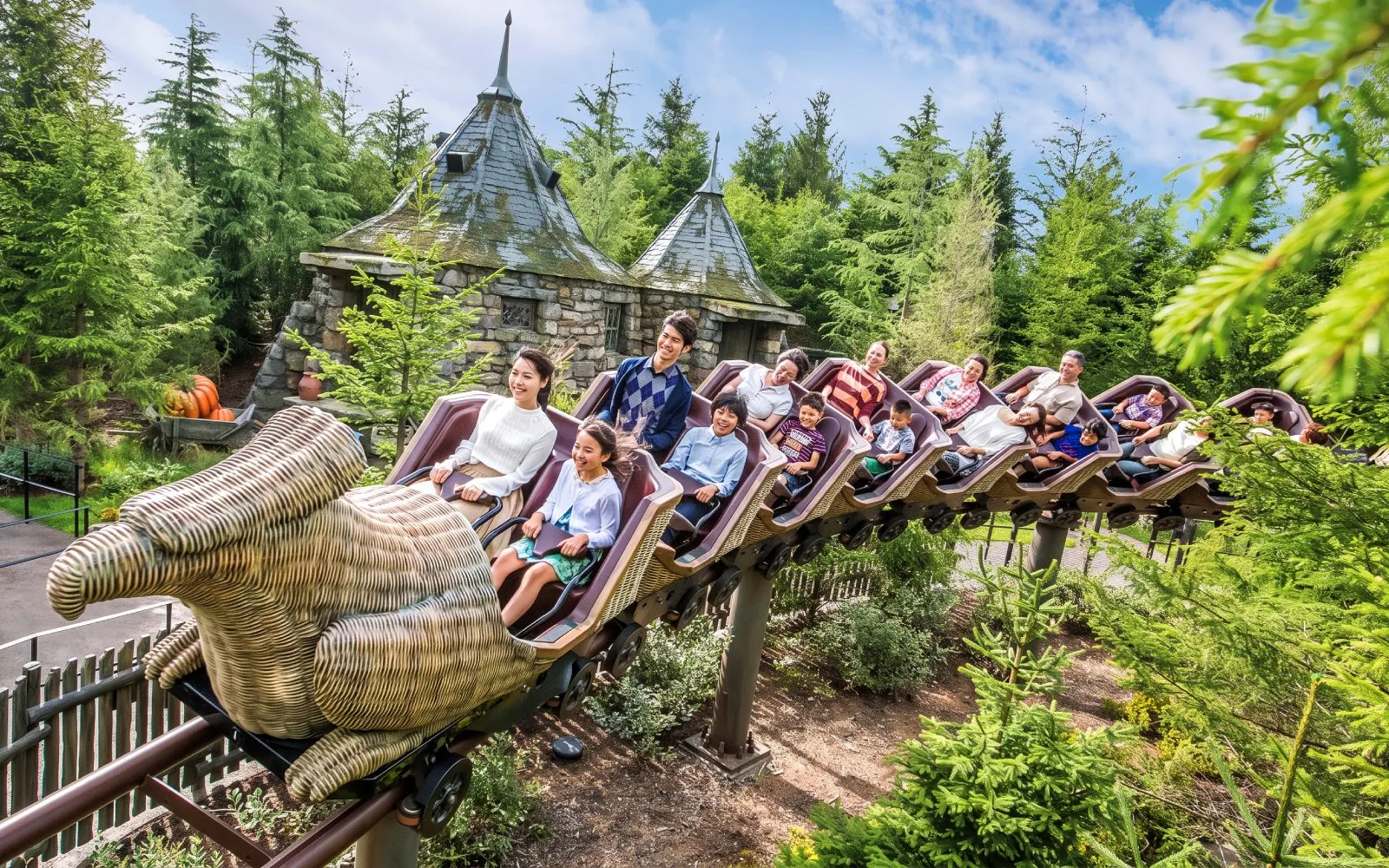 Families enjoying the Flight of the Hippogriff roller coaster at Universal Studios Japan, Osaka.