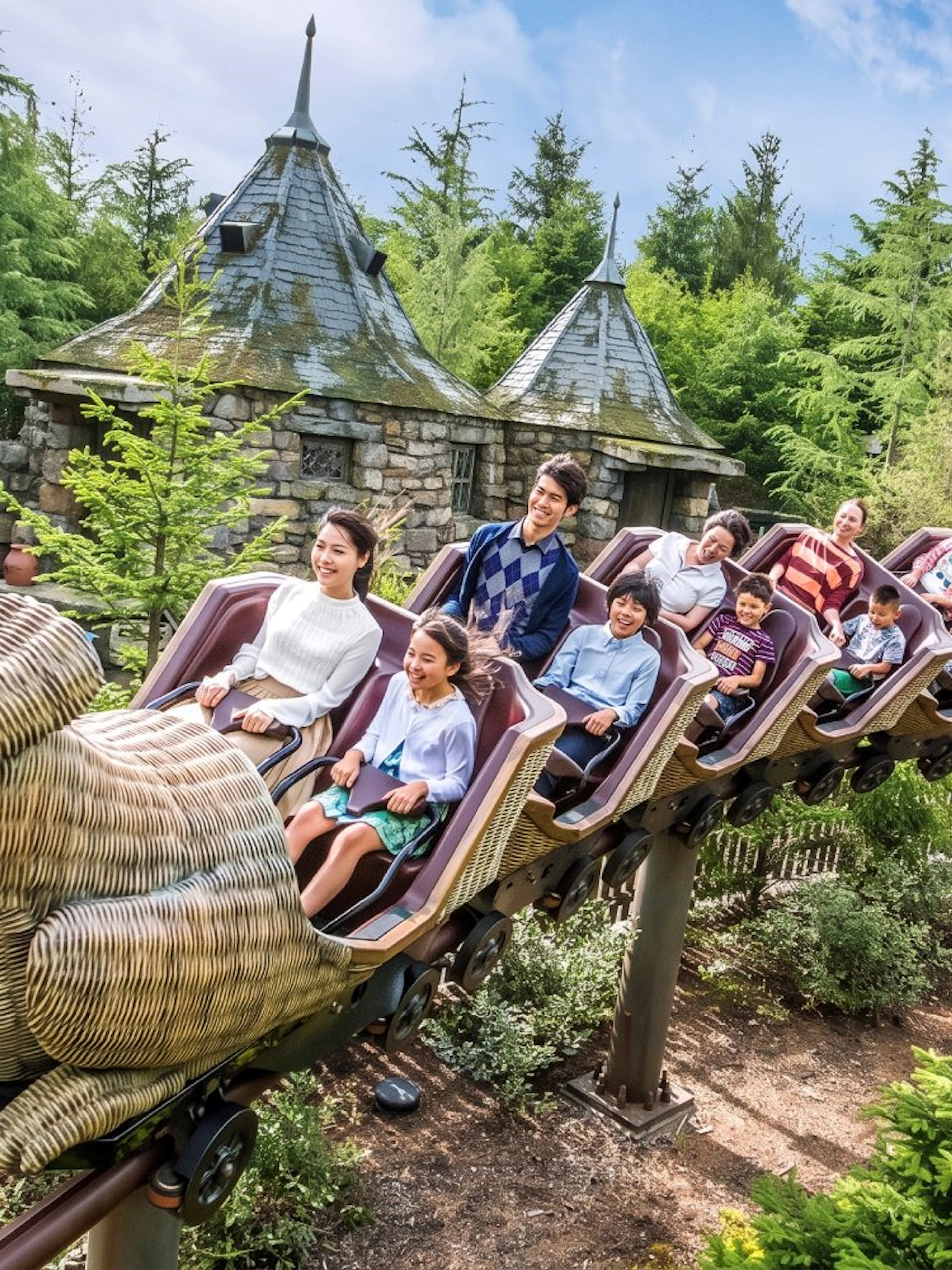 Families enjoying the Flight of the Hippogriff roller coaster at Universal Studios Japan, Osaka.