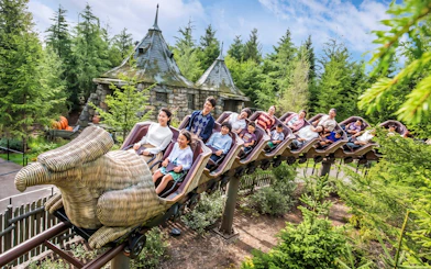 Families enjoying the Flight of the Hippogriff roller coaster at Universal Studios Japan, Osaka.
