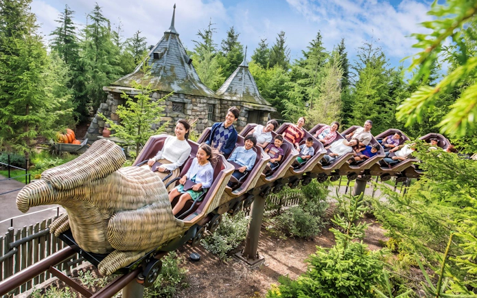Families enjoying the Flight of the Hippogriff roller coaster at Universal Studios Japan, Osaka.