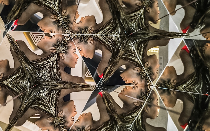 Mirrored reflections in Illuseum Berlin's Infinity Room.