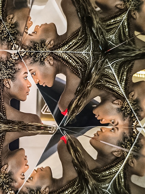 Mirrored reflections in Illuseum Berlin's Infinity Room.