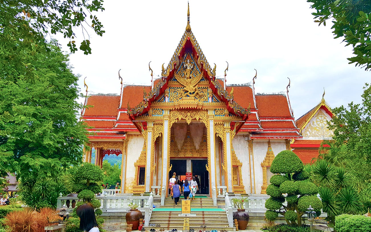 Wat Chalong temple entrance in Phuket City, part of the day tour with Tiger Park tickets.