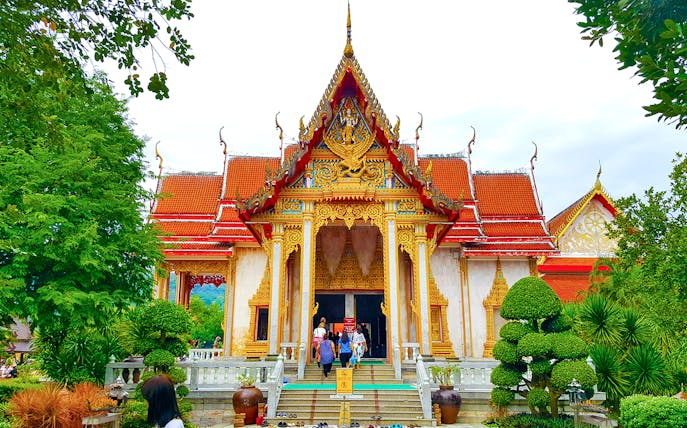 Wat Chalong temple entrance in Phuket City, part of the day tour with Tiger Park tickets.