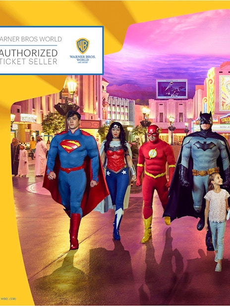 Warner Bros. World Abu Dhabi characters with child in theme park setting.