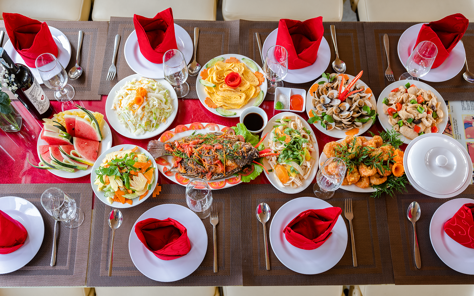 Buffet spread with seafood, salads, and fruit on Deluxe Day Cruise to Ha Long Bay.