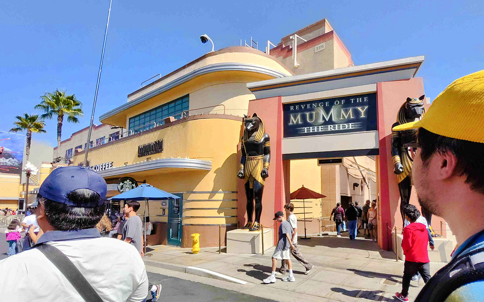 Revenge of the Mummy ride entrance at Universal Studios Hollywood with Anubis statues.